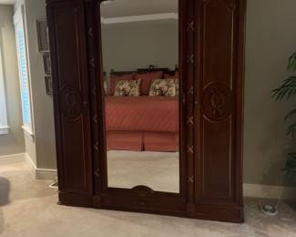 Mirrored armoire