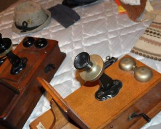 two wall crank phones, with innards