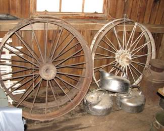 Milk canisters, steel wagon wheels