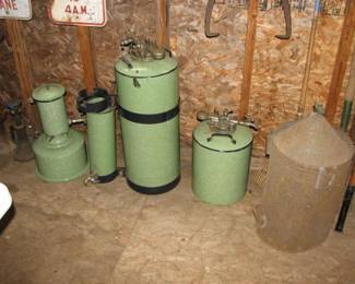 we believe these are related to milking, possibly homogenizer or pasteurizer. They are green enamel with white specs. Cool pieces