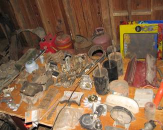 there are many tables full of vintage car parts of all kinds 1930's and up