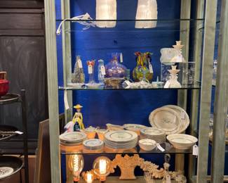 LED filament 1500 hour light bulbs on bottom shelf.  View of lighted wood display shelves. 