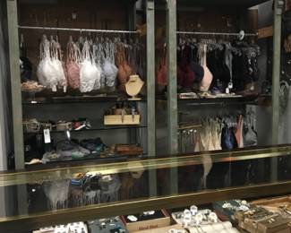 Set of two wood display shelves, lighted,  Shown here with clothing rod conversion.