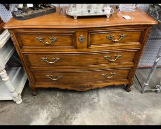 Carved French Style Walnut 4 Drawer chest. $300