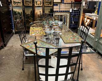 Vintage 1980’s beveled glass top iron table with 4 iron chairs with chair pads