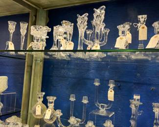 Wood lighted display shelf with 3 glass shelves.  Vintage crystal candlestick collection 