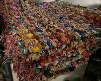 Throw rug made with woven silk sari strips and jute. $5 each