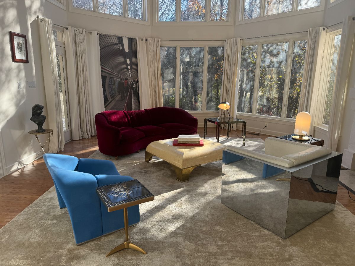 Modway Cusp Lounge Chair (33"W x 29"D x 27"H) & Milo Baughman Chrome Clad Cube Leather Club Chair (38"W x 36"D x 28"H) & 1940's French Velvet Burgundy Upholstered Sofa with Original Horse Hair Stuffing (82"W x 48"D x 28" Back Height) & Zanaboni Brass Foot & Parchment Top Modern Coffee Table (44"W x 44"D x 16"H) & Chrome & Brass with Tinted Glass Top Side Table (26"W x 26"D x 22"H) & Serge Mouille Reproduction Tri-Pod Lamp