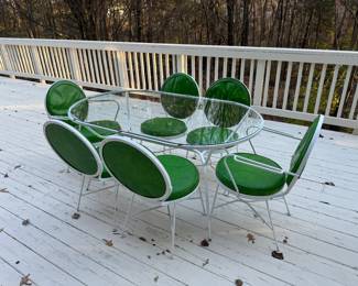 Mid-Century Modern Steel with Glass Top Oval Patio Table (33-1/2"W x 60"L x 29"H) & Mid-Century Modern Vinyl Upholstered Patio Chairs (2 Armchairs & 4 Side Chairs)