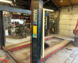 Precision Metal Works, model QP12000 4-post hydraulic auto lift. With a 2hp 208-230 single phase