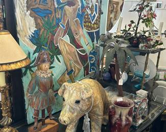 Neoclassical leather-top writing table, Leon Collins painting "420", Paisley-clad pig, and more.