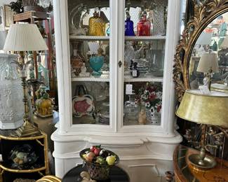 Painted cabinet with wire-grill doors, Iron side table with bronze apron, Pair of round framed porcelain placques, and more