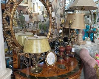Inlaid demilune console table, Bouillotte lamp, Oval foliate-carved mirror, and more.