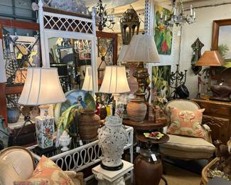 Painted rattan console, Pair Louis XV bergere chairs, White floral Capodimonte ginger jar lamp, Monkey side table, Pair of Handpainted Chinese Vase lamps, Foliate & floral Italian chandelier.