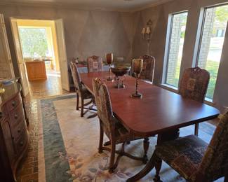 This Duncan Phyfe table is incredible! In this picture it has 4 of the 5 leafs in it. At its smallest it's 60 inches by 40 inches. At its largest its a full 10 feet!