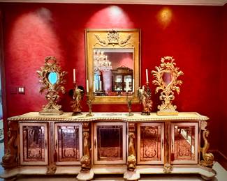 Venetian side cabinet with carved  giltwood dolphins Circa 1860
Width: 130”  Depth:  25”  Height:  38”
Purchased from Randall Tysinger Antiques