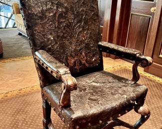 19th c. Portuguese tooled leather chairs, one of pair