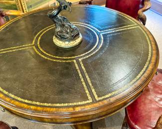 Gilt tooled leather top of Maitland-Smith table