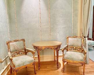 Water gilt table and two chairs