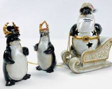 Set of Three Ceramic Christmas Penguins, Including Santa Sleigh
