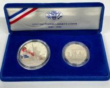 United States Liberty Coins 1886-1986 90% Silver 1 oz silver Coin and Clad Half Dollar Coin in box
