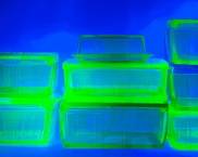 7pc Vintage Green Uranium Glass Refrigerator Boxes and One Butter Dish
