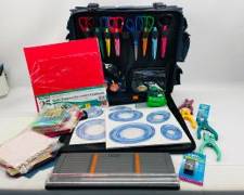 Rolling Luggage Full of CROP IN STYLE LC Crafting Kit: Includes Multi-Color Craft Scissors, Decorative Cardstock, Cutting Mats, Circle Cutters, And More. Perfect For Scrapbooking, Card Making, And DIY Projects.
