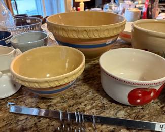 . . . large and small yellow ware bowls 