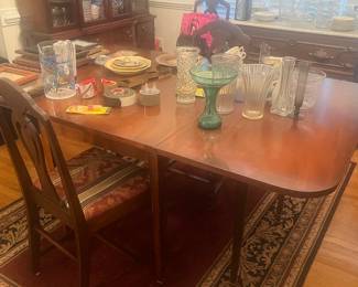 Cherry dining room table with 6 chairs
