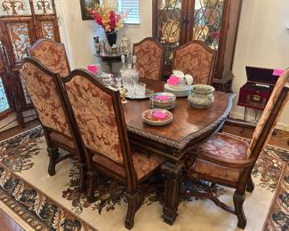 Formal dining table with six chairs