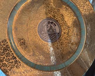 gilded dishes with a touch of teal 