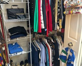 assortment of womens clothing, plus some purses, and shoes 