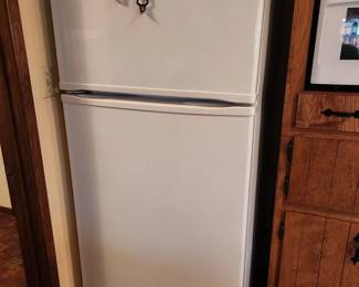 A very clean Whirlpool Refrigerator. 