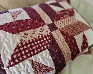 quilt with two pillows