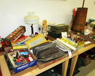 vintage license plates and boxes full of miscellaneous