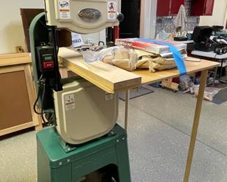 Grizzly 14" Band saw with custom made base, extra blades and custom table