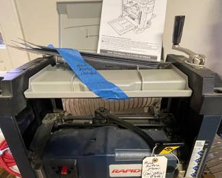 Ryobi surface planer, includes NEW blades, hose, rolling base and custom made cabinet