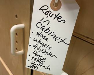 Router in custom made cabinet. Includes hose, wheels, adjuster fence, table and on/off switch