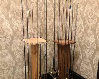 over 32 rod and reels + handmade rod stands