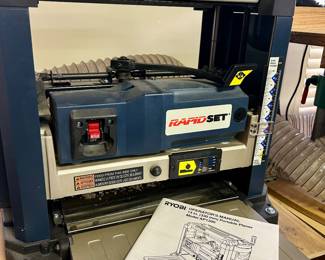 Ryobi surface planer, includes NEW blades, hose, rolling base and custom made cabinet