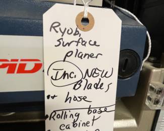 Ryobi surface planer, includes NEW blades, hose, rolling base and custom made cabinet