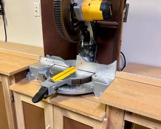 Dewalt 12" Compound Miter Saw with custom made cabinet, hose, & extra blades