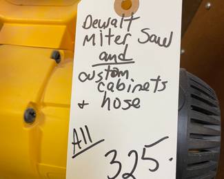 Dewalt 12" Compound Miter Saw with custom made cabinet and hose.