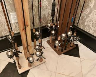 over 32 rod and reels + handmade rod stands