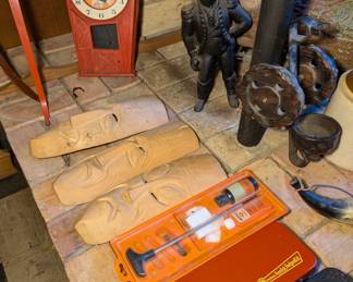 Clock, Iron Statue and Gun Cleaning Kits