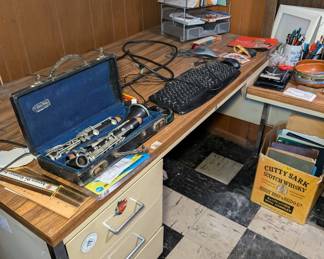 Desk, Clarinet and Office Supplies