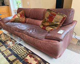 Giorgio collection leather sofa, decorative pillows