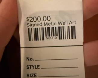 Signed metal wall art