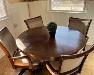 Dining set with rolling chairs