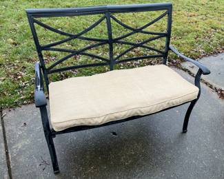 Metal loveseat with cushion